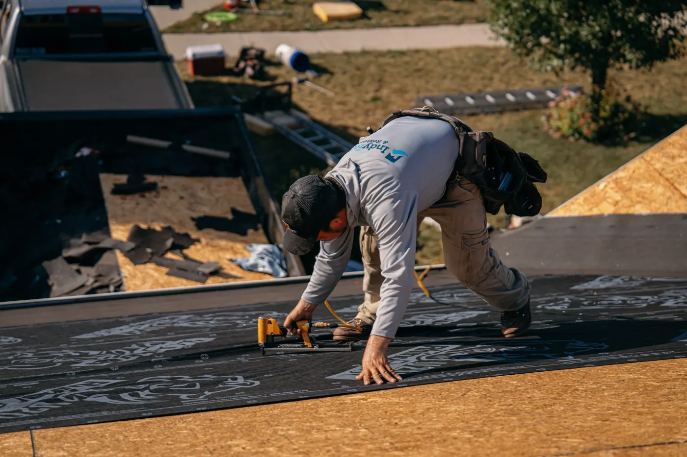 Tarping and dry-in on a Lakestone Bridge commercial roof